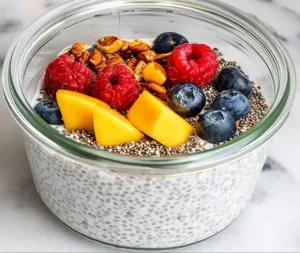 Kefir Chia Pudding Recipe 6 kefir chia pudding topping step e1752978313919 300x253 1